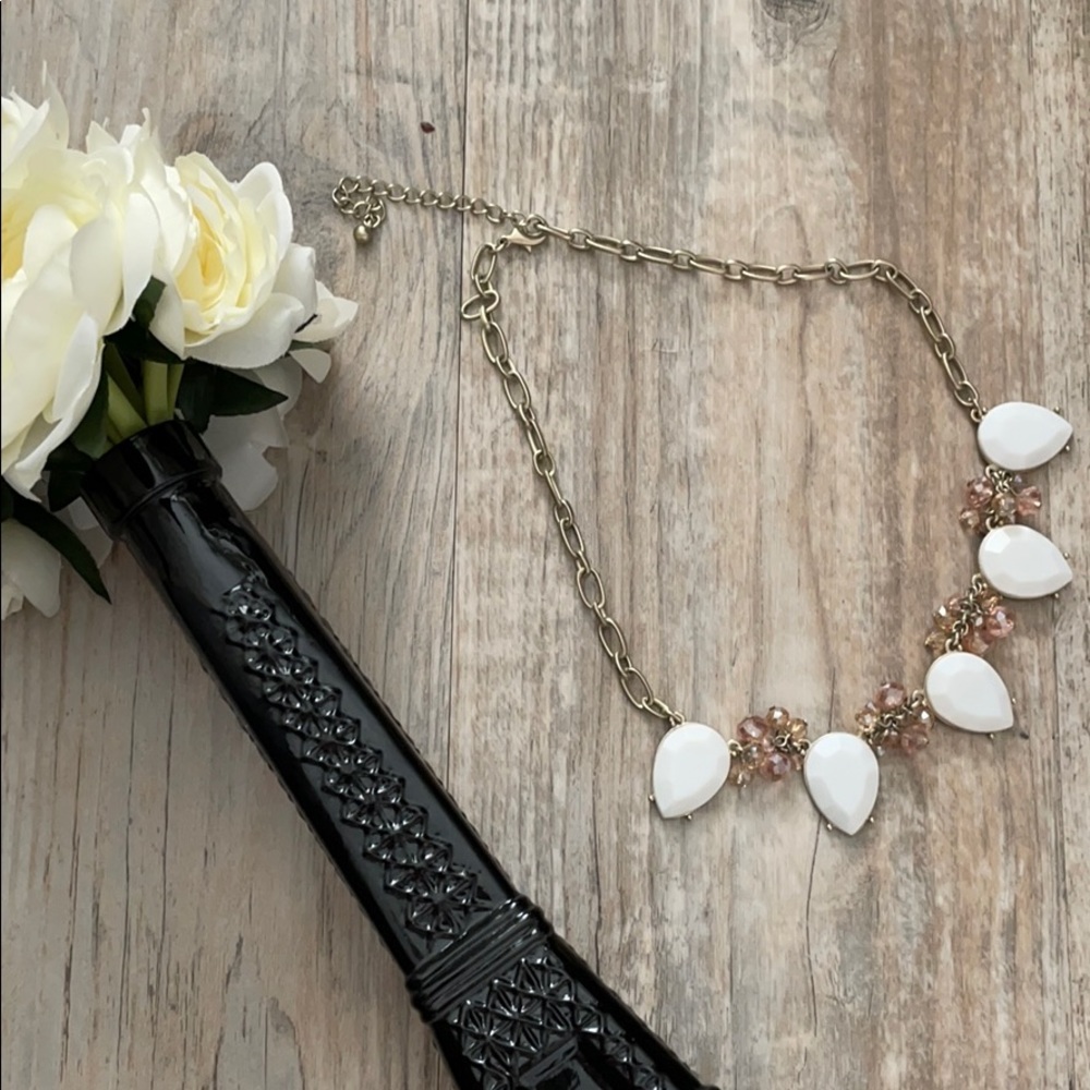pink, white, and gold statement necklace